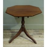 A mahogany octagonal tripod table the top boxwood strung and crossbanded on a turned vasular