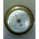 A brass and mahogany cased aneroid barometer the original owner was Admiral Beatty, diameter of case