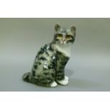 Winstanley Cats black and grey tabby with white paws, signed to the base, 19cm