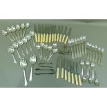 A set of silver plated cutlery including, dinner knives and forks, dessert knives and forks, soup