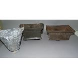 Two cast iron drain hoppers of rectangular outline, together with an aluminium octagonal tapered