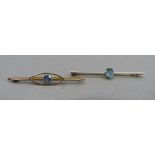 An Edward VII aquamarine bar brooch in 15ct gold, the oval faceted stone claw set to the centre of a