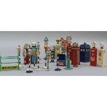 A quantity of Dinky petrol pumps, telephone and police box, road signs, traffic lights, etc,
