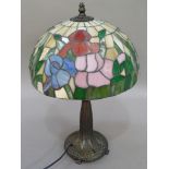 A Tiffany style table glass lamp in pink, green, red and cream, 46cm