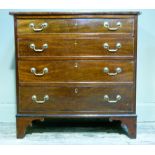 A 19th century mahogany chest of four graduated drawers on shaped bracket feet, the top drawer lined