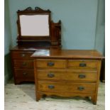 An Edwardian mahogany dressing chest with mirror, together with a walnut chest of two short and