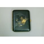 A Japanese Komai style black lacquered cigarette case inlaid in white and yellow metal with mount