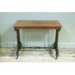 A Victorian mahogany window table on twin refectory supports joined by a stretcher, turned legs with