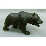 A Bavarian carved figure of a bear, 12.5cm high x 22cm long