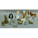 Four china and pottery dogs by Beswick and Sylvac and a pottery bird, together with various hearth
