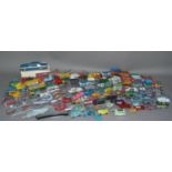 A quantity of vintage die cast metal vehicles by Dinky, Corgi and other manufacturers, together