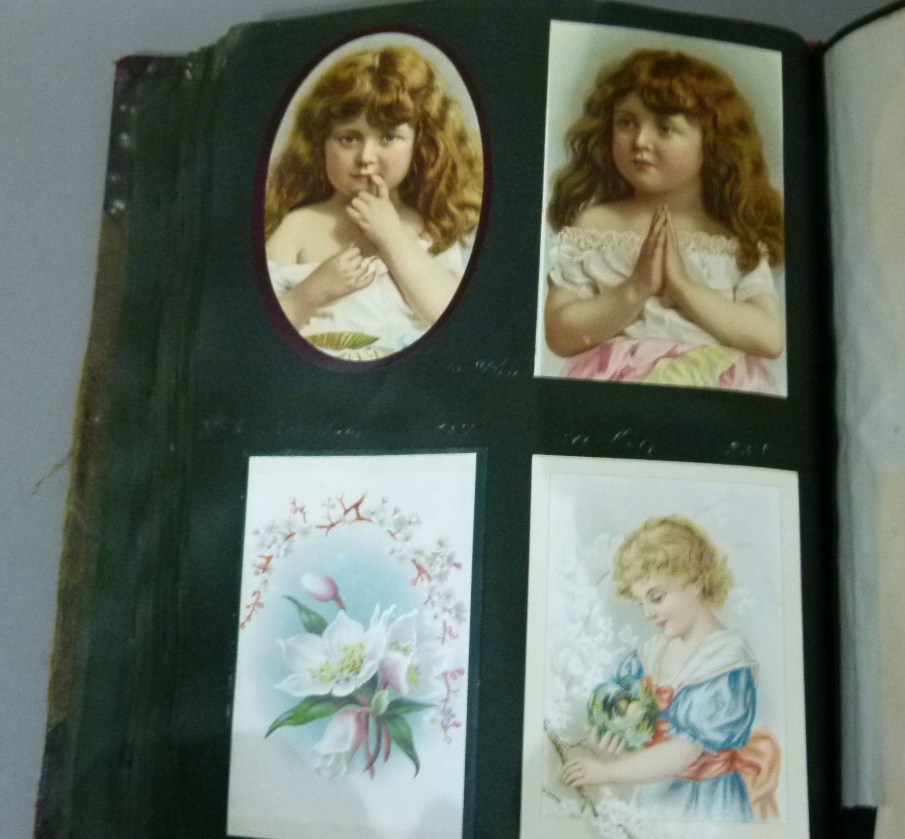 A Victorian scrap album oval and rectangular cards, various subject matters including cats, - Image 6 of 8