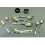 Eight various silver and sterling silver spoons and two silver napkin rings, approximately 5oz
