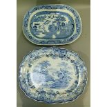 A 19th century blue and white printed meat dish with a pattern of river landscape with house, bridge