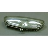 A silver evening purse with finger loop, Birmingham 1913