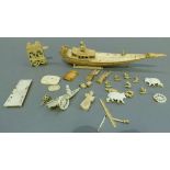 A bag of mainly Indian ivory and bone carvings including, ceremonial boat, cart, carriage,