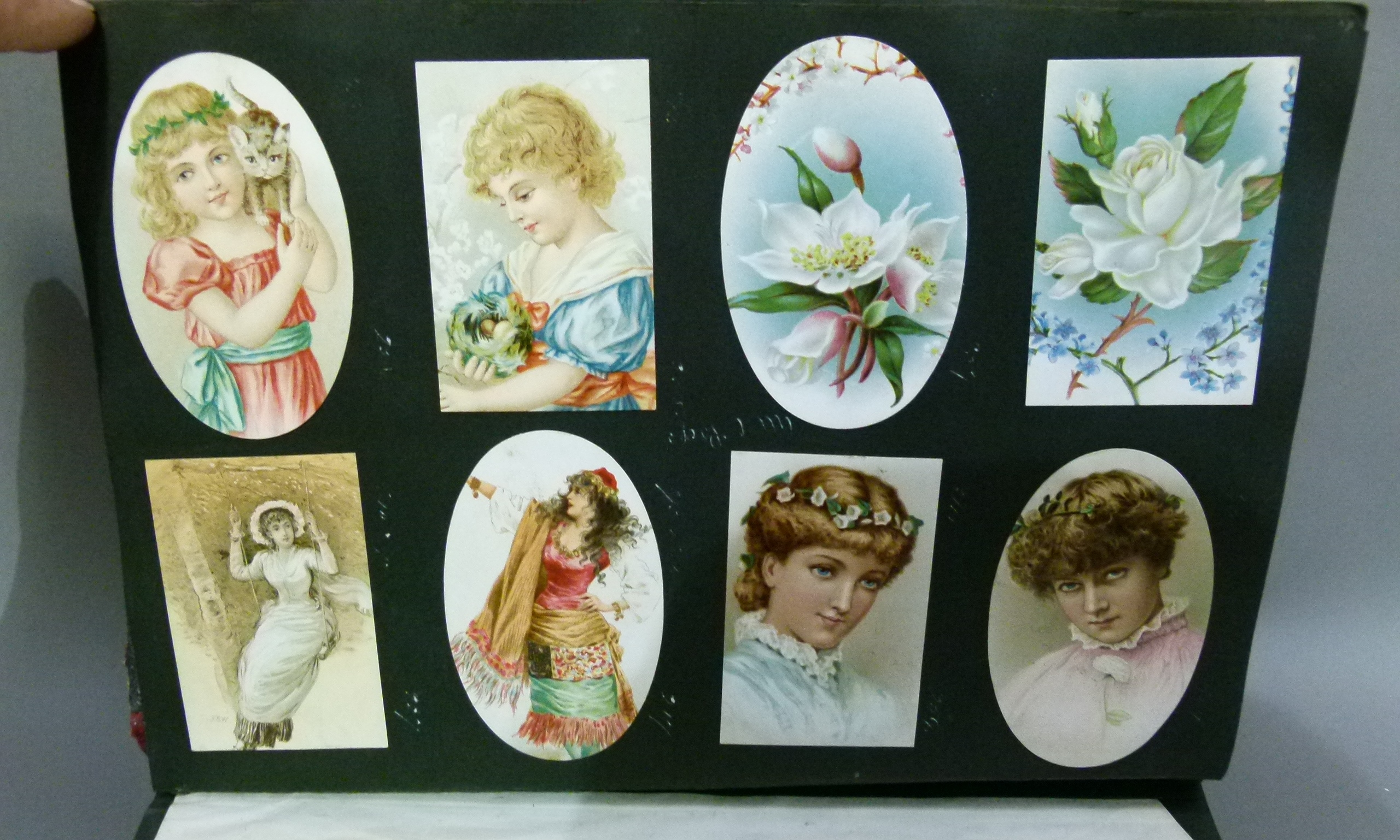 A Victorian scrap album oval and rectangular cards, various subject matters including cats, - Image 5 of 8