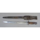 A 1907 design Sanderson brothers and Newbold Ltd bayonet with metal capped leather sheath wooden
