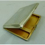 A silver cigarette case of engine turned decoration Birmingham 1924, approximately 3oz