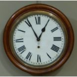 An Ansonia mantel clock with circular stained case and painted dial, 40cm diameter