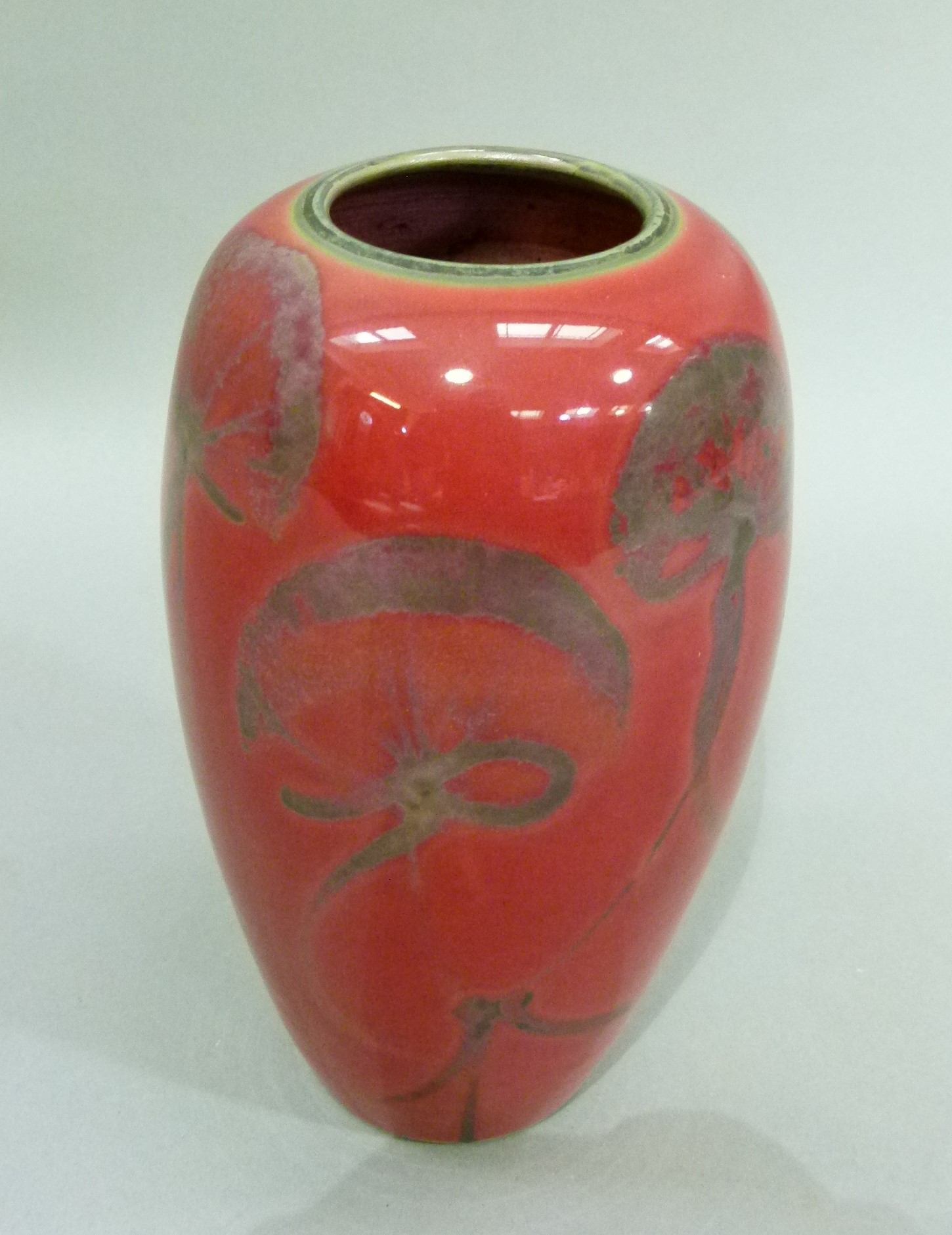 A red flambe vase of ovoid form, decorated with flowers, 20cm high - Image 2 of 2
