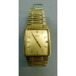 A Seiko gentleman's quartz wristwatch in rolled gold case No 760162, rectangular brushed gilt dial