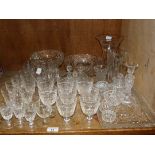 A quantity of cut glass including wines, sherries, dressing table set, bowls, vases etc