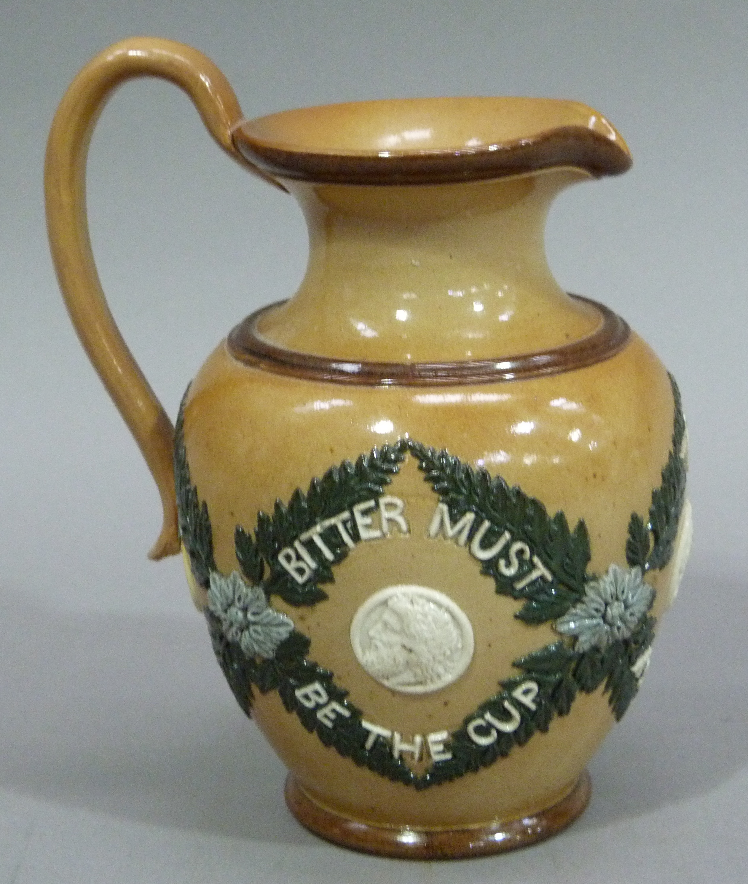 A Doulton Lambeth stoneware jug, 'Bitter must be the Cup' 17cm high - Image 3 of 5