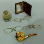 A daguerreotype in leather case, three pairs of gilt wire framed spectacles, glass ink and a