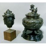 A reproduction bronze koro and cover the pierced lid with Dog of Fo finial the cauldron shaped