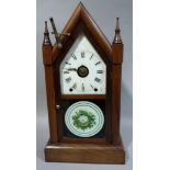 A Winward's eight day railway alarm clock in a simulated rosewood case, 54cm high