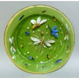 A Victorian green glass circular plate polychrome enamelled in colours with insects and white