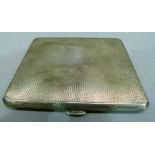 A silver cigarette case of engine turned finish, gilt interior, Birmingham 1948, initialled to