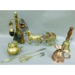 A quantity of brass and copper ware including a small copper measure, hand bell, fire irons, teapot,