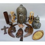 A wooden mask, pair of wooden figures, wooden cylindrical vase, wooden apple box, various other