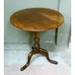 A George III figured walnut snap top tripod occasional table the circular top above a turned