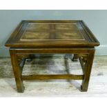 A mahogany coffee table inlaid with brass beading and burrwood to the centre on square framing, in
