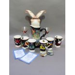 A set of six reproduction Clarice Cliff mugs jazz design, two napkin rings and two cocktail glasses,