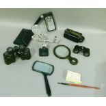 A pair of field binoculars, various magnifying glasses, a cased set of Kershalls Tivoli