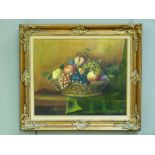 A still life basket of fruit upon a table, oil on canvas, indistinctly signed to lower right