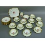 A Tuscan china tea service, bread and butter plate 25cm, twelve cups and saucers, eleven tea plates,