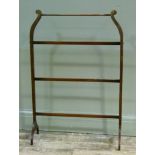 An Edwardian mahogany towel rail of four tiers