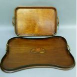 An Edwardian mahogany tray, rectangular serpentine outline, inlaid to the centre with a floral motif