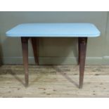 A blue Formica kitchen table