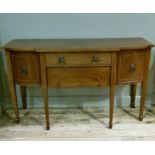 An early 20th century mahogany side board inlaid with satinwood banding and having three drawers