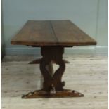 An oak refectory table on waisted panel standards joined by upstretcher, 184cm x 80cm