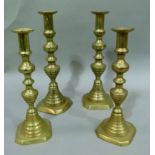 Two pairs of Victorian brass table candlesticks (4)