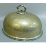 A Victorian silver plated domed meat dish cover and stand, 51cm wide