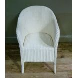 A white painted Lloyd Loom tub chair