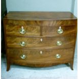 A Regency mahogany caddy top chest with figured frieze fitted with two short and two long graduated,